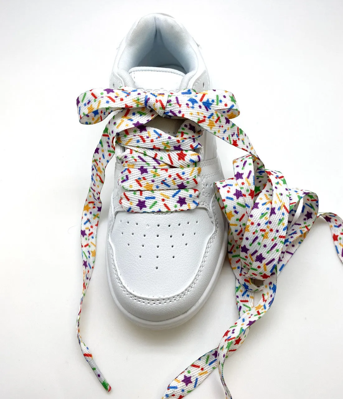 Shoelaces with sprinkles in primary colors printed on standard shoelace material 54" long